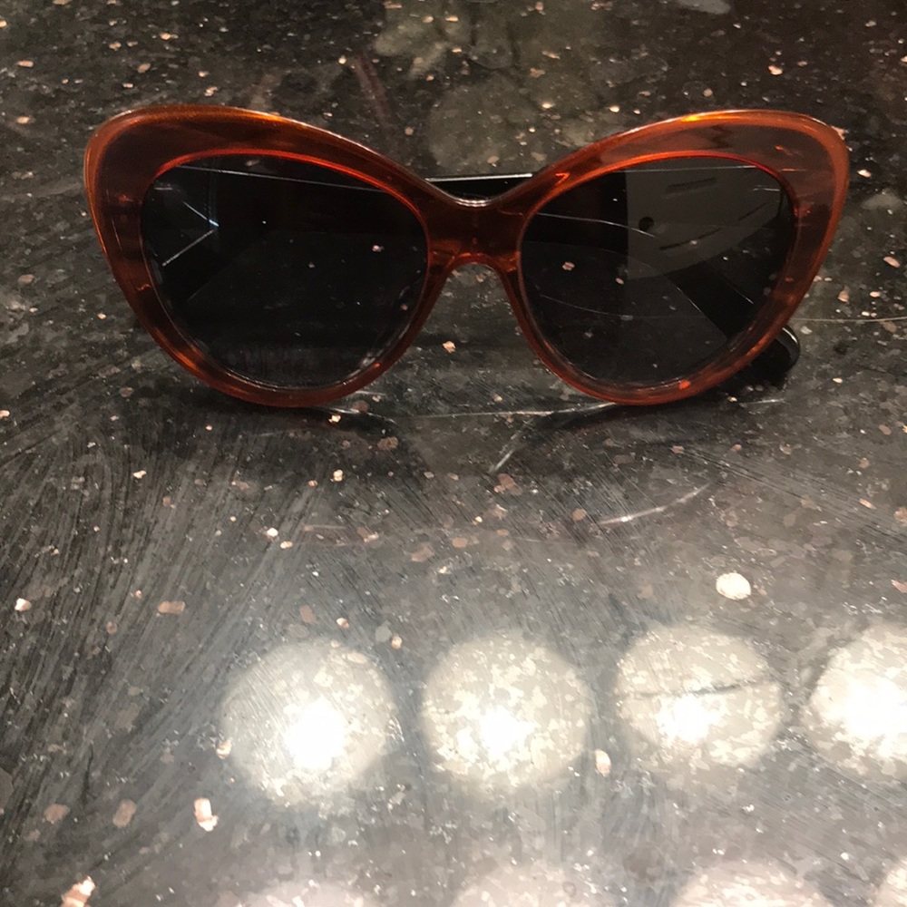 Dior  no scratches,worn a few times.  No case